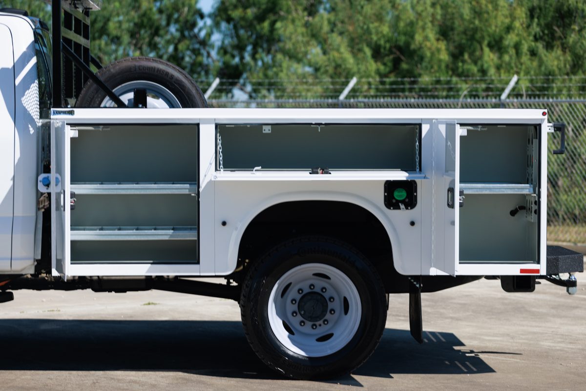 Service body with compartments open — configured for field operations